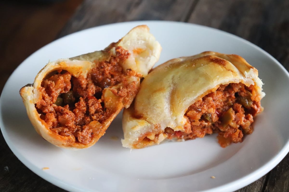 María Luisa chorizo empanada with its filling visible