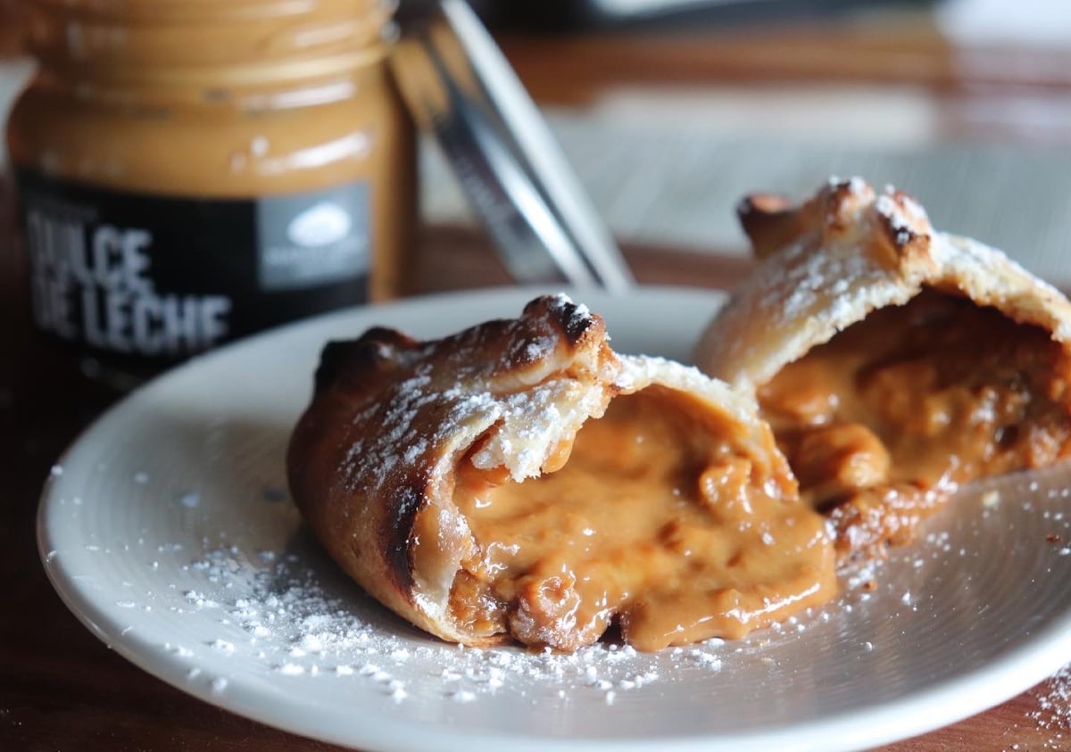 María Luisa dulce de leche empanada with its filling visible